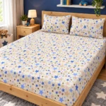 Blue Star Pure Cotton Bed Sheet with two pillow covers on a natural pine wooden bed in a cheerful kids' room