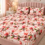 Pink Magnolia 3D Bedsheet with two pillow covers on an arched pale-pink upholstered headboard bed