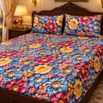 Royal Mauve 3D Bedsheet with two pillow covers on a carved dark teak headboard bed