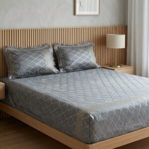 close up of the silver grey velvet bedsheet fabric and gold print