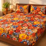 Sunset Bloom 3D Bedsheet with two pillow covers on a walnut mid-century bed