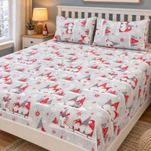 Winter Gnome Pure Cotton Bed Sheet with two pillow covers on a white painted wooden bed with a slatted headboard